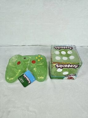 Squeezy Toy Ball Green Toy with Box NWT